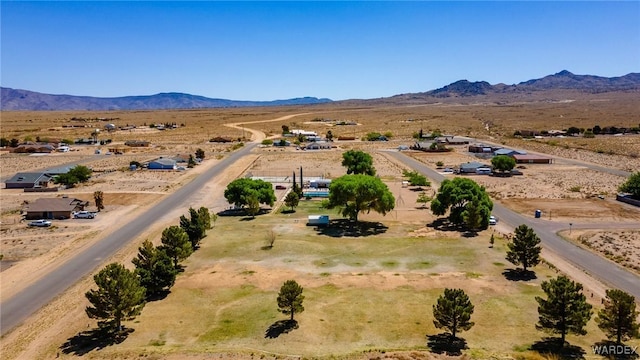 bird's eye view featuring a mountain view, a rural view, and a desert view