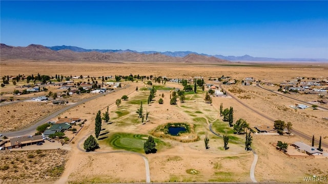 birds eye view of property with a rural view, view of desert, and a mountain view