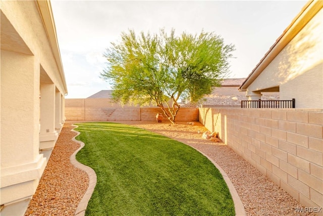 view of yard featuring a fenced backyard