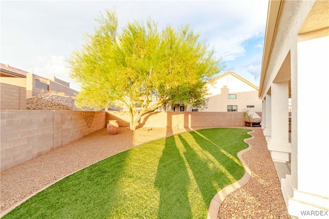 view of yard featuring a fenced backyard