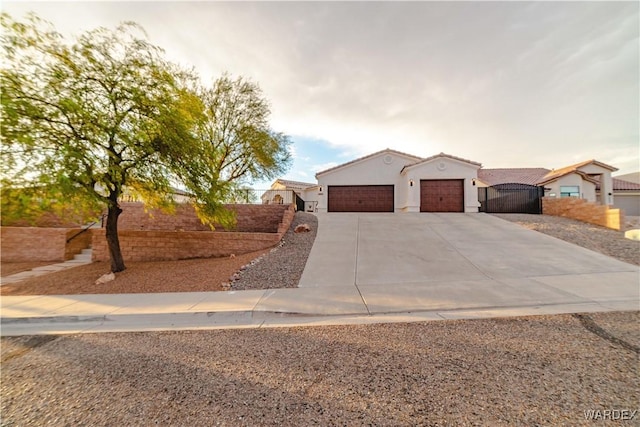 single story home with a garage, driveway, fence, and stucco siding