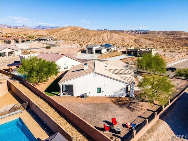 bird's eye view with a residential view and a mountain view