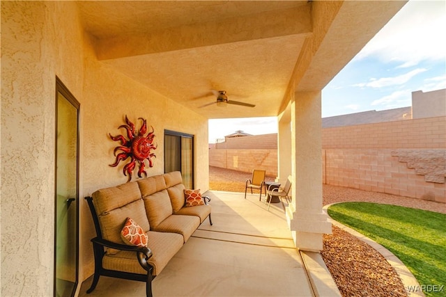 view of patio featuring ceiling fan and a fenced backyard