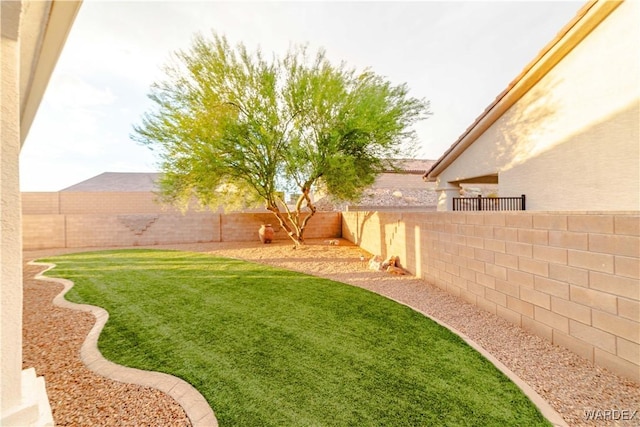 view of yard featuring a fenced backyard