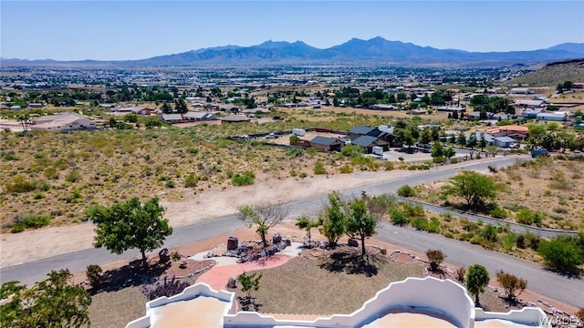 birds eye view of property with a residential view and a mountain view