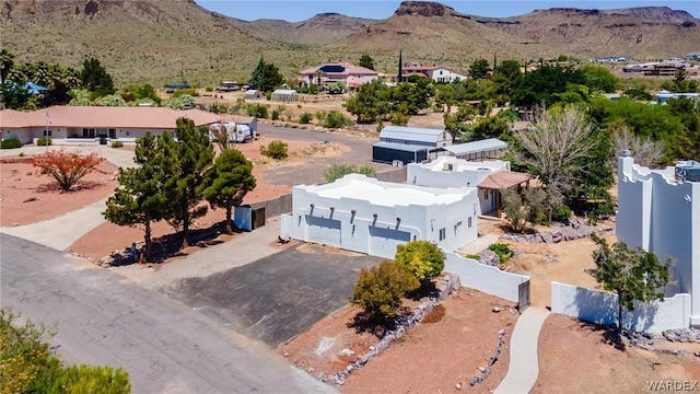 birds eye view of property with a residential view and a mountain view