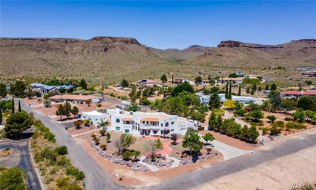 drone / aerial view featuring a mountain view