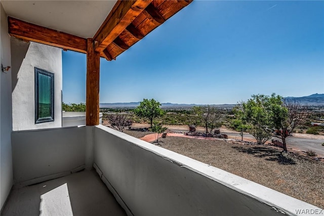 balcony featuring a mountain view