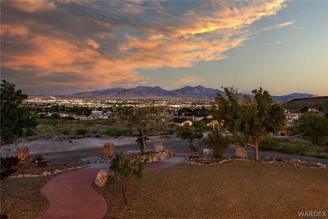 yard at dusk with a mountain view