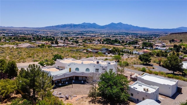 birds eye view of property with a residential view and a mountain view