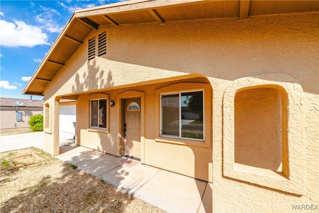 3144 N Prescott St, Kingman, AZ 86401 - exterior space with stucco siding