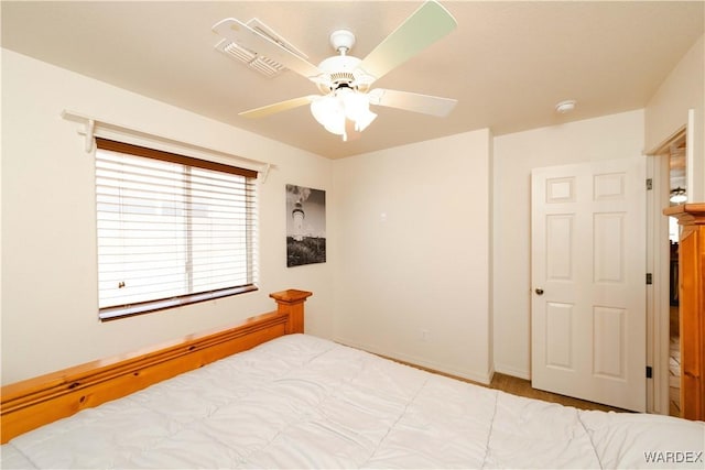 3144 N Prescott St, Kingman, AZ 86401 - bedroom with a ceiling fan and baseboards