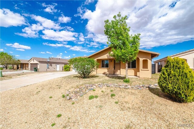 3144 N Prescott St, Kingman, AZ 86401 - ranch-style home with stucco siding and driveway