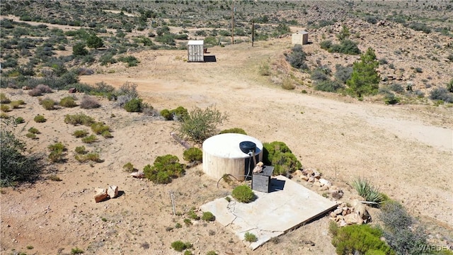 aerial view featuring a desert view