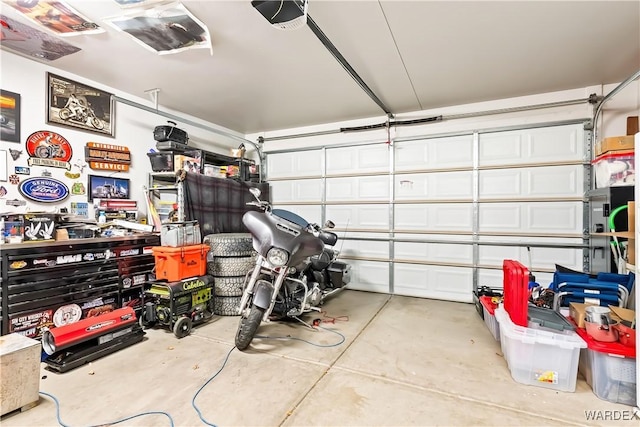 garage featuring a garage door opener