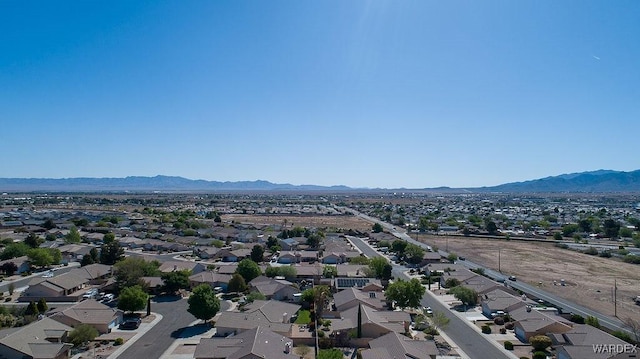 drone / aerial view with a residential view and a mountain view