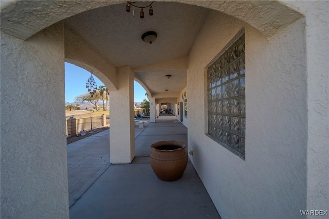 view of patio / terrace featuring fence