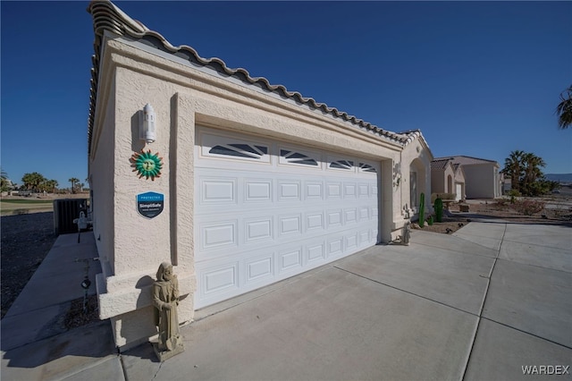 garage with driveway