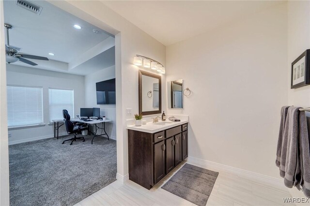 bathroom featuring a ceiling fan, recessed lighting, visible vents, and baseboards