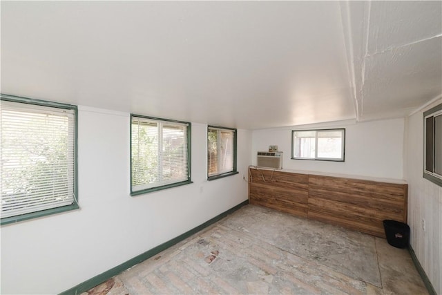 3345 W Smith Dr, Golden Valley, AZ 86413 - unfurnished sunroom featuring a wall unit AC