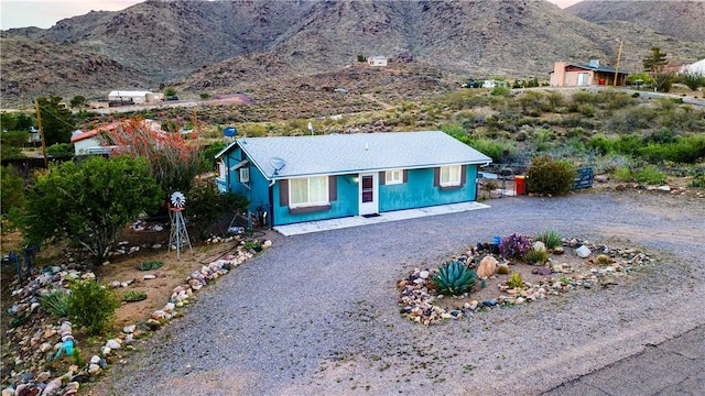 3345 W Smith Dr, Golden Valley, AZ 86413 - view of front facade featuring a mountain view and driveway