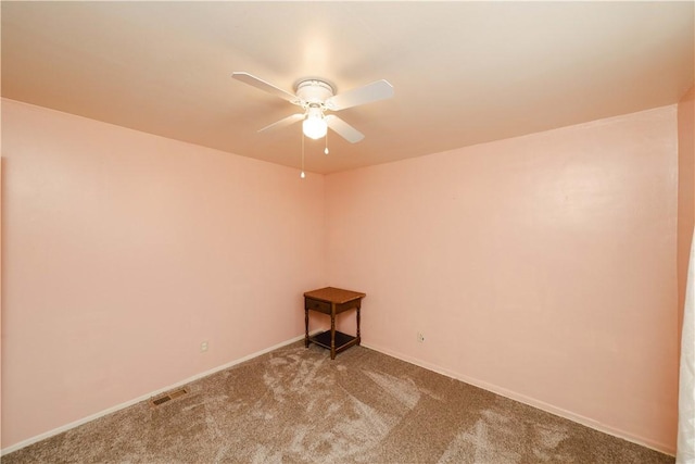 3345 W Smith Dr, Golden Valley, AZ 86413 - empty room with a ceiling fan, carpet flooring, and baseboards