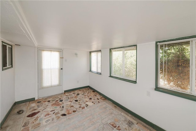 3345 W Smith Dr, Golden Valley, AZ 86413 - empty room featuring baseboards and plenty of natural light