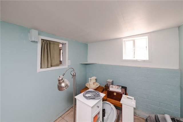 3345 W Smith Dr, Golden Valley, AZ 86413 - below grade area with light tile patterned floors and baseboards