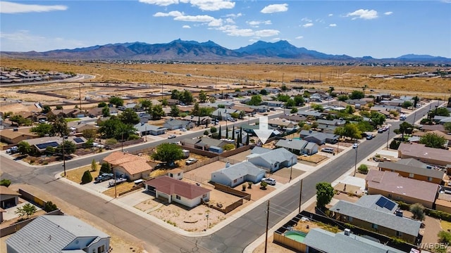 birds eye view of property featuring a residential view and a mountain view