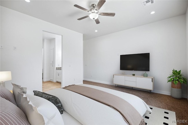 bedroom with baseboards, visible vents, and recessed lighting