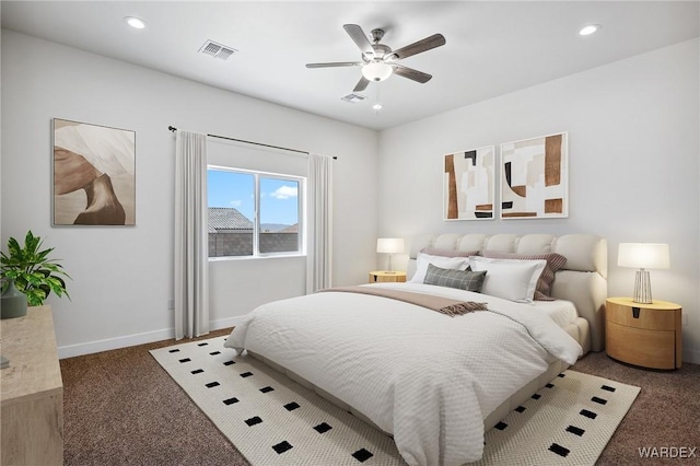 bedroom featuring baseboards, visible vents, dark colored carpet, and recessed lighting