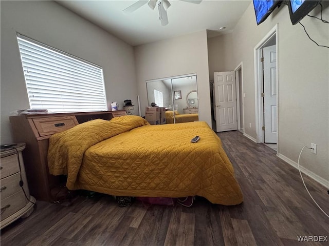 1481 E Topaz Cir Unit 2, Fort Mohave, AZ 86426 - bedroom featuring baseboards, a closet, a ceiling fan, and dark wood-type flooring