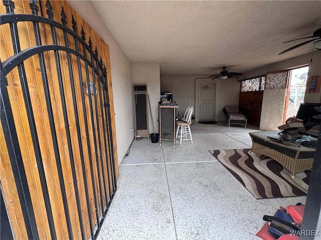 1481 E Topaz Cir Unit 2, Fort Mohave, AZ 86426 - view of patio / terrace featuring a gate and a ceiling fan
