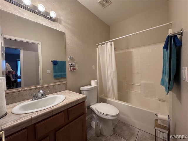 1481 E Topaz Cir Unit 2, Fort Mohave, AZ 86426 - bathroom featuring shower / tub combo, toilet, visible vents, tile patterned floors, and vanity