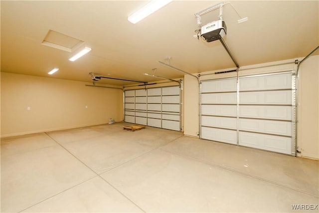 garage featuring a garage door opener