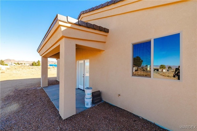 view of home's exterior featuring a patio and stucco siding