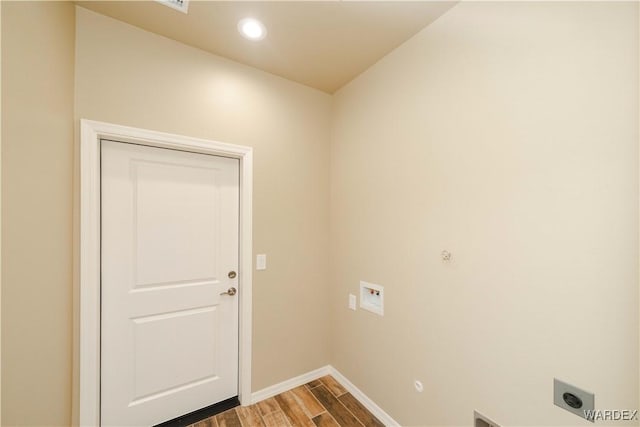 laundry room featuring washer hookup, hookup for an electric dryer, wood finished floors, laundry area, and baseboards