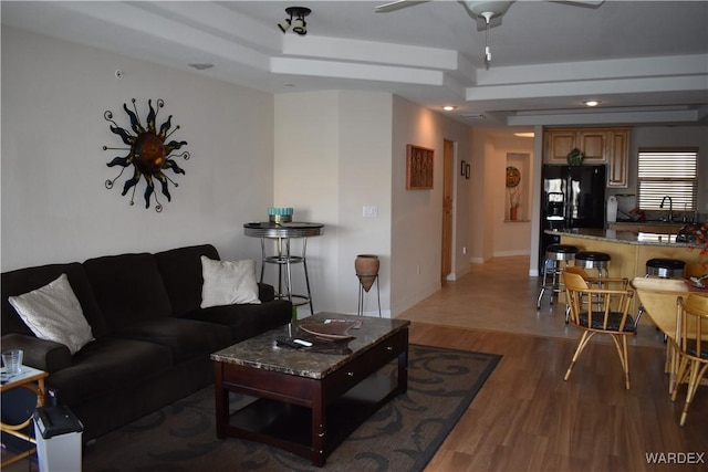 living room featuring recessed lighting, dark wood-style flooring, and ceiling fan