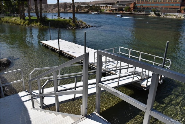 dock area with a water view