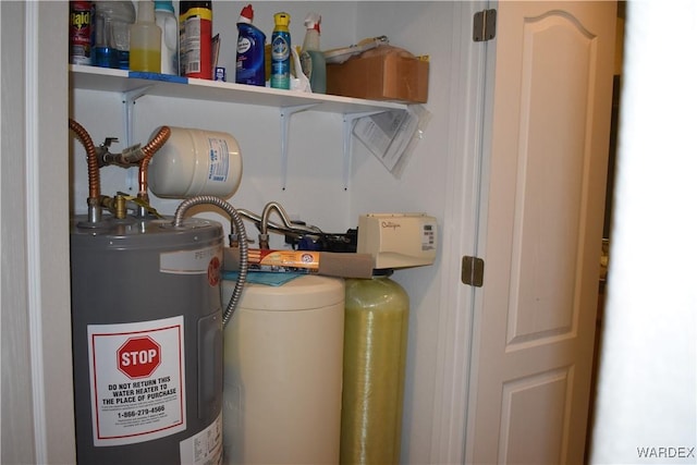 utility room with electric water heater