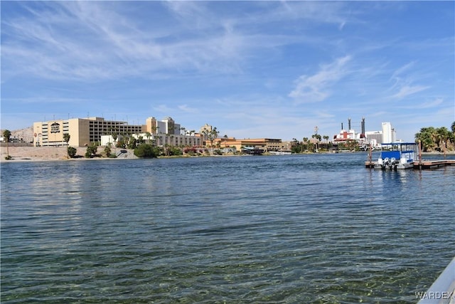 view of water feature with a dock