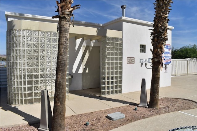 exterior space featuring stucco siding