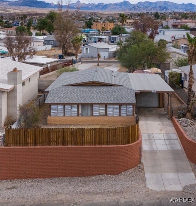 exterior space featuring a residential view and a mountain view