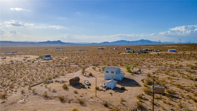 bird's eye view featuring view of desert, a rural view, and a mountain view