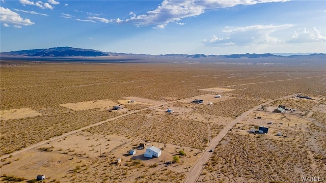 drone / aerial view with a mountain view and a desert view