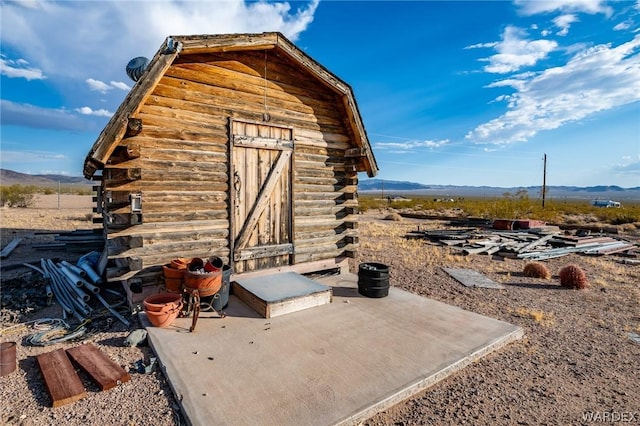 view of shed with a mountain view