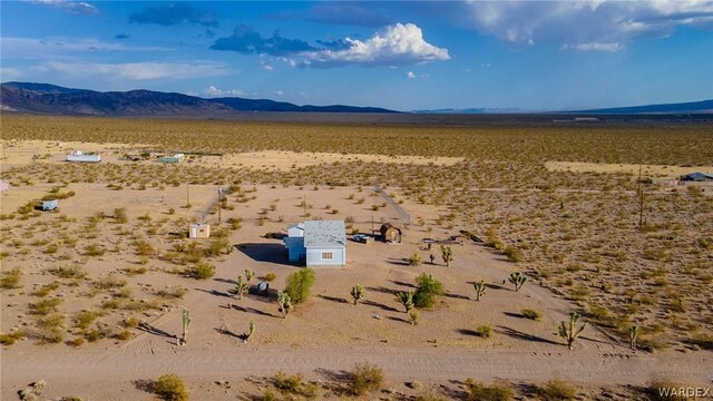 aerial view with a desert view and a mountain view