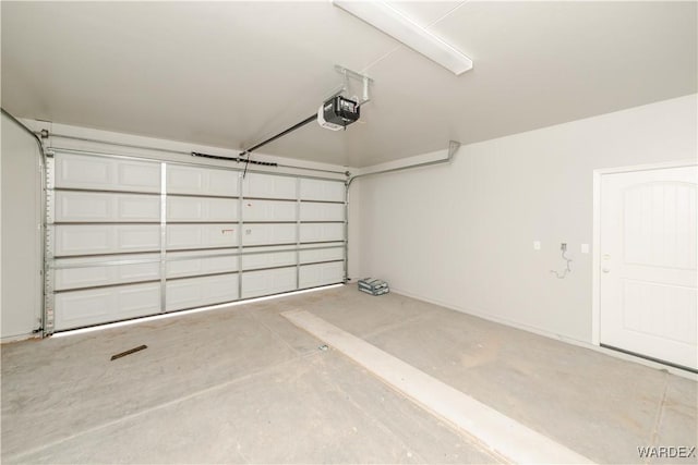 garage featuring a garage door opener