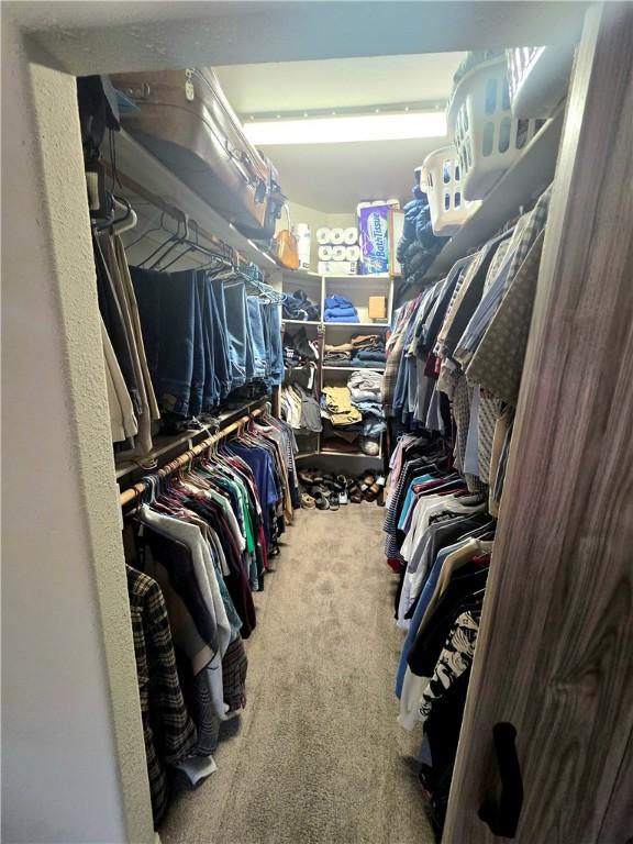 4132 Monte Silvano Ct, Kingman, AZ 86401 - spacious closet featuring carpet floors