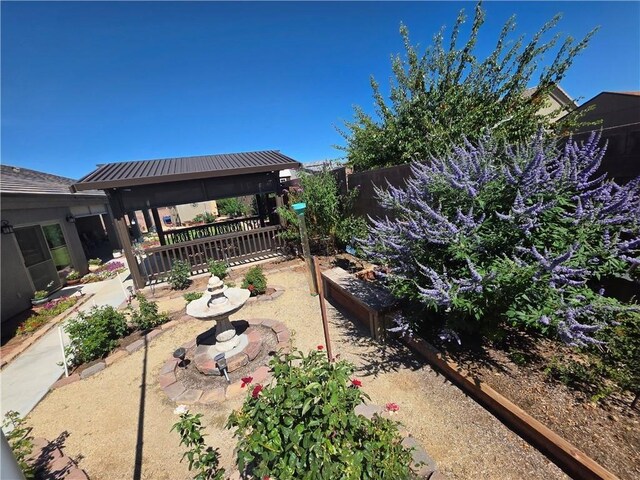 4132 Monte Silvano Ct, Kingman, AZ 86401 - view of yard featuring a gazebo, a patio, and a garden